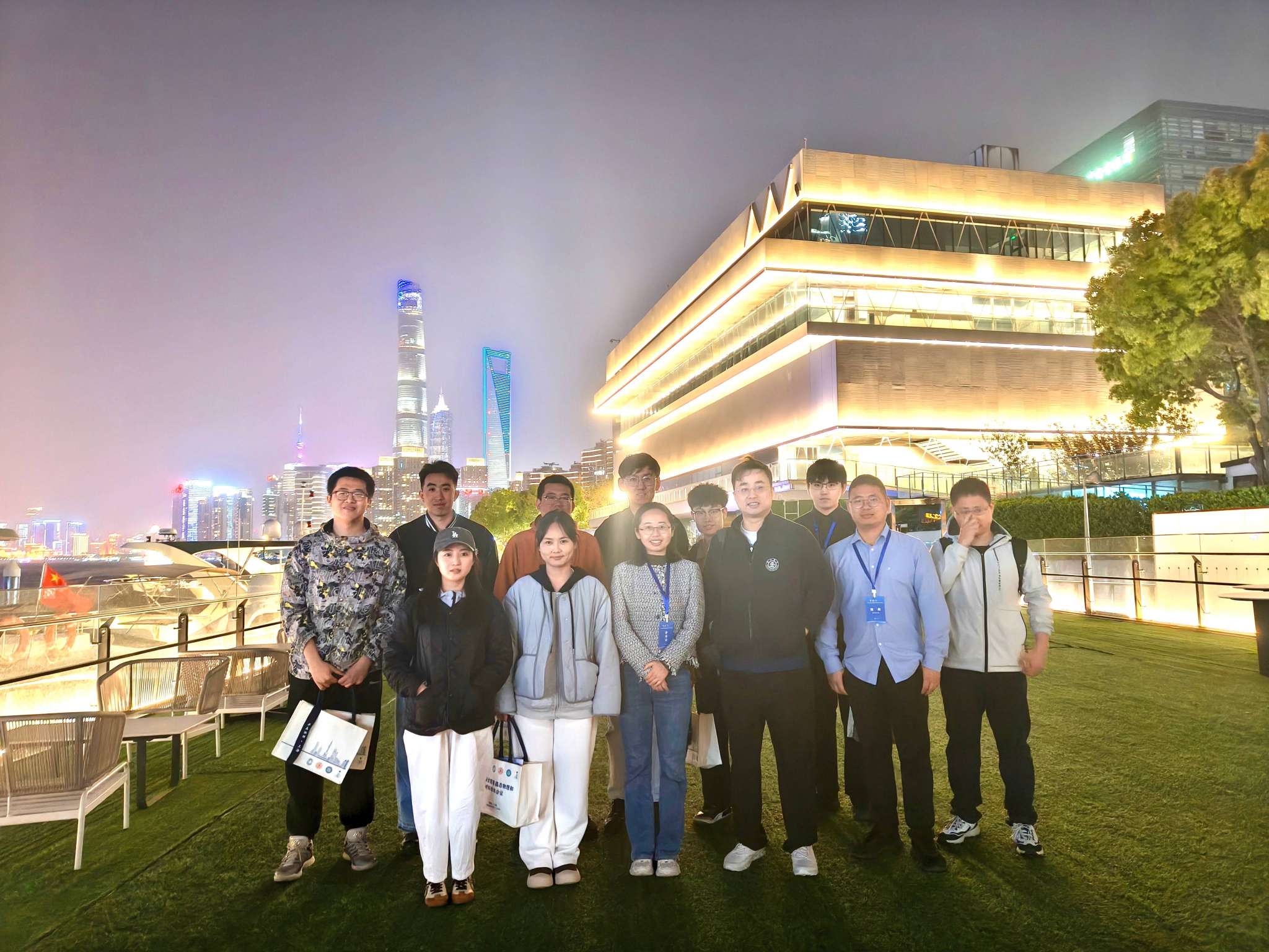 Group photo by the Huangpu River